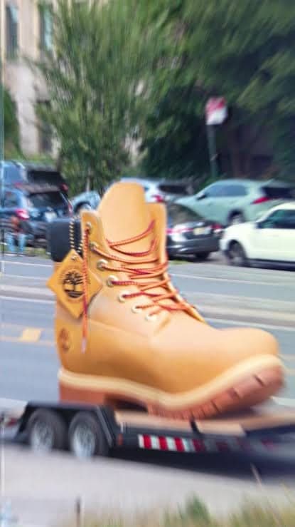 A giant Timberland boot mounted on a trailer
