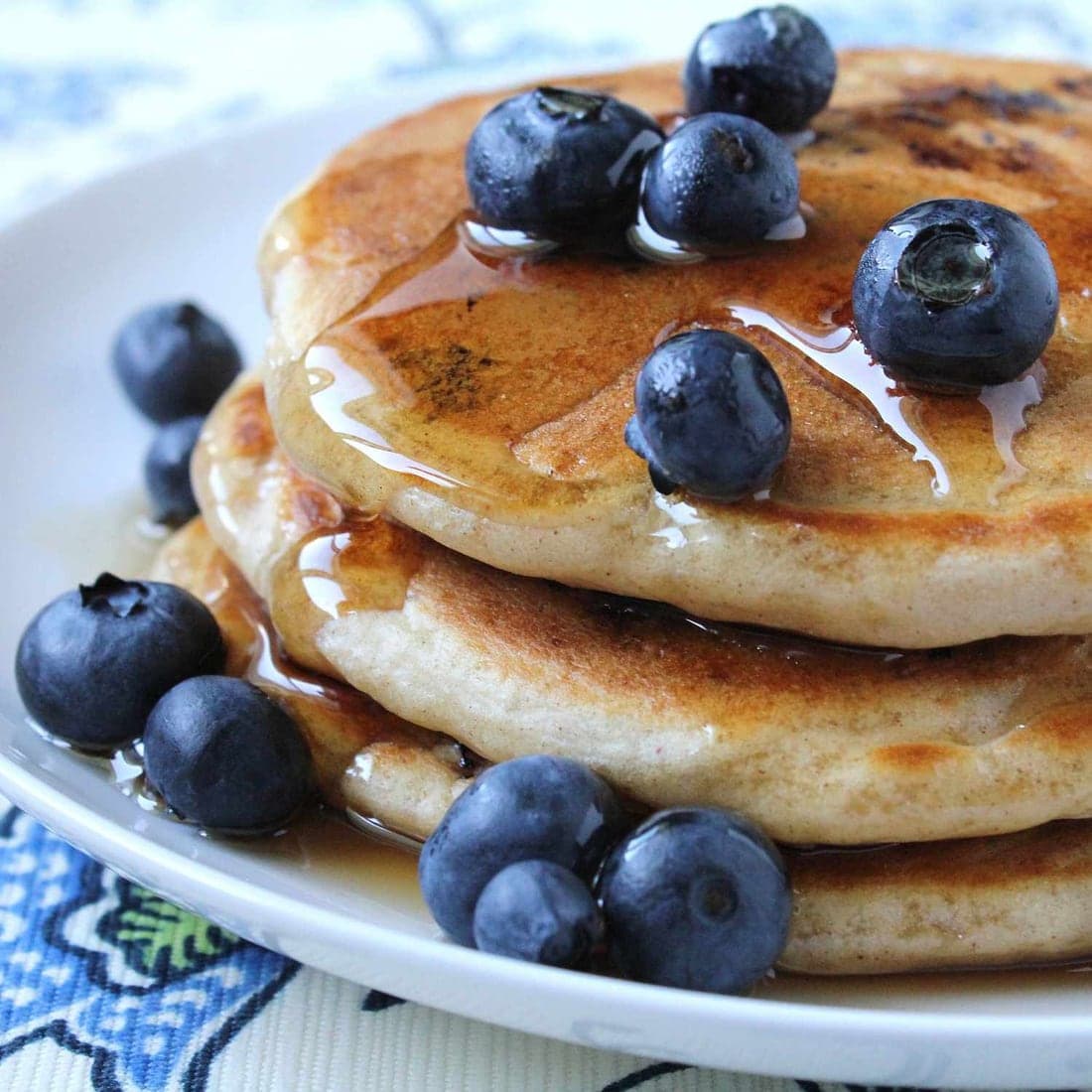 A stack of blueberry pancakes